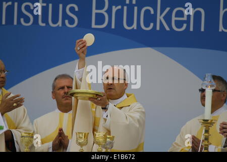 Regensburg, Germany. 29th May 2014. Thousands of faithful celebrated the open air Ascension Day mass on day two of the 99th German Katholikentag. The chief celebrant was Rudolf Voderholzer, the bishop of Regensburg. Credit:  Michael Debets/Alamy Live News Stock Photo