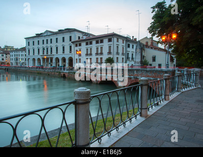 Night time view of the Ponte Dante in the Italian town of Treviso in Veneto region of Northern Italy Stock Photo