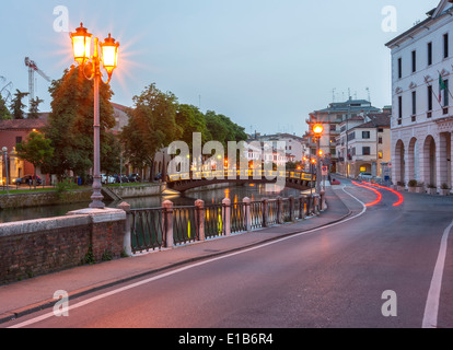 Night time view of the Ponte Dante in the Italian town of Treviso in Veneto region of Northern Italy Stock Photo