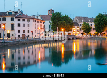 Night time view of the Ponte Dante in the Italian town of Treviso in Veneto region of Northern Italy Stock Photo