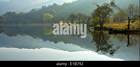 Reflections of Llyn Gwynant a lake in the valley of Nantgwynant at the heart of Snowdonia National Park Gwynedd North Wales UK, Stock Photo