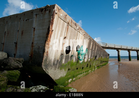 Remains of a section of the Mulberry Harbour, Omaha Beach, Normandy, France Stock Photo