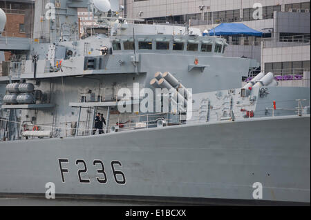 West India Dock, Isle of Dogs, London UK. 29th May 2014. HMS Montrose, Type 23 Duke class Frigate, berths among the offices of Canary Wharf in London as part of the 350th Anniversary of the Royal Marines. Montrose is normally based in Devonport. Credit:  Malcolm Park editorial/Alamy Live News Stock Photo