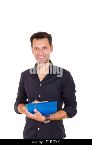 young business man taking notes against white background Stock Photo