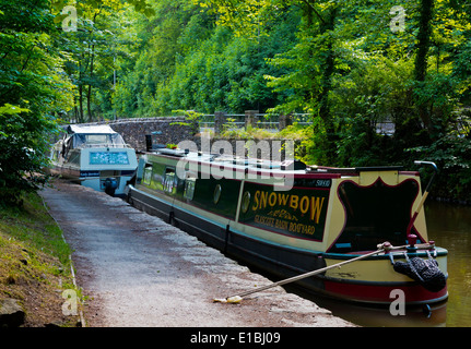 Narrowboats moored on the Peak Forest Canal in Whaley Bridge in the High Peak Derbyshire England UK which was completed in 1805 Stock Photo