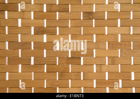 Woven bamboo mat background texture with white weave detail showing the natural fibers of the bamboo, full frame Stock Photo