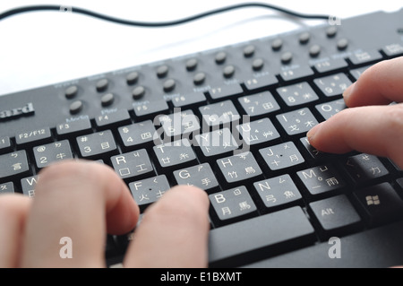 Typing on Chinese keyboard; focus on right hand first finger
