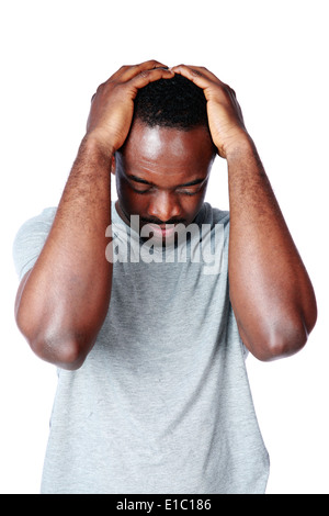 African man having headache isolated on white background Stock Photo