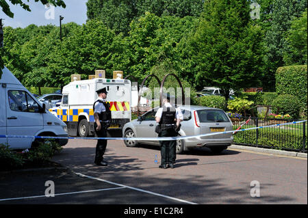 Derry, Londonderry, Northern Ireland. 30th May, 2014. Forensic Officers at the scene of a firebomb attack in the reception area of a Londonderry hotel. The Everglades Hotel, in the Prehen area of the city, was evacuated after the device was reported at 23:15 BST on Thursday. The device exploded a short time later when Army bomb experts were working to make it safe. Credit:  George Sweeney/Alamy Live News Stock Photo