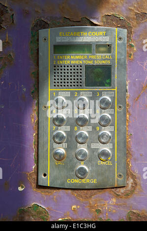 Old rusty bell push pad for entry into apartments Stock Photo