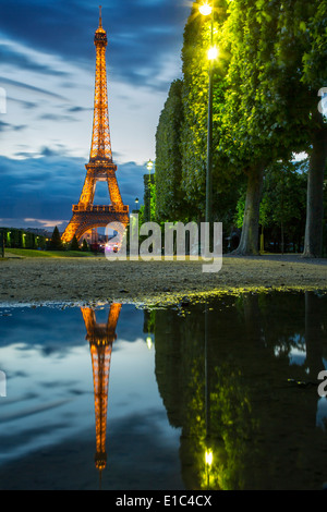 Dusk reflections below the Eiffel Tower, Paris France Stock Photo