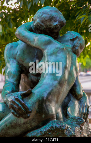 Bronze copy of Auguste Rodin's 'Le Brasier' (The Kiss), near the garden entrance to L'Orangerie Museum, Paris France Stock Photo