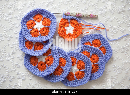 Crochet shapes using African Flower Pentagons motifs Stock Photo