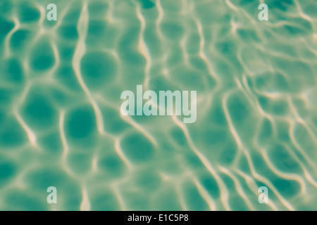 Ripple patterns on the water in a pool. Stock Photo
