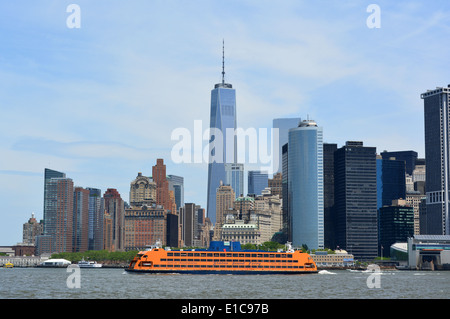 Staten Island Ferry and the Lower Manhattan skyline. Stock Photo