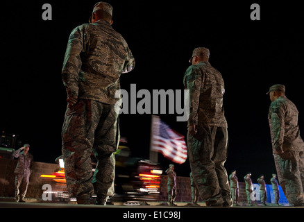 Nellis Airmen salute U.S. Marine Corps Cpl. Jon-Luke Bateman during his dignified arrival Jan. 25, 2012, at Nellis Air Force Ba Stock Photo