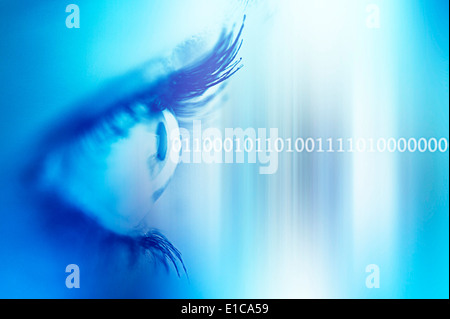 woman eye with binary code emerging from it Stock Photo