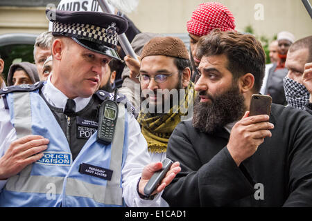 London, UK. 30th May 2014. Mohammed Abdul Ahad (centre) convicted at Old Bailey court on 10th Dec 2019 under the Terrorism Act for four charges of disseminating terrorist material. Seen here during a radical Islamist demonstration in May 2014 led by Anjem Choudary outside the London Central Mosque against the recent arrest in Lebanon of fellow radical cleric, Omar Bakri Muhammad, who was accused of forming a militant group to weaken the Lebanese governmentGuy Corbishley/Alamy Live News Stock Photo