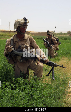 U.S. Marines with 2nd Battalion, 8th Marine Regiment (Reinforced), conduct a security halt during an operation in the Helmand p Stock Photo