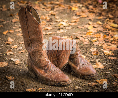 A pair of brown cowboy boots found in a cemetery in Paris France. Stock Photo