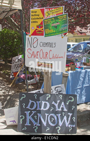 Close up GMO protest signs at an anti GMO and Monsanto rally on May 24, 2014 in downtown Asheville, NC Stock Photo