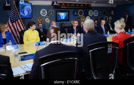 Washington DC, USA. 30th May, 2014. United States President Barack Obama attends a hurricane preparedness meeting at FEMA Headquarters, May 30, 2014 in Washington, DC. From left to right: Kathy Sullivan, Administrator, National Oceanic and Atmospheric Administration; Valerie Jarrett, Assistant to the President and Senior Advisor; President Obama; and John Podesta, Counselor to the President. Credit: Olivier Douliery/Pool via CNP/dpa/Alamy Live News Stock Photo