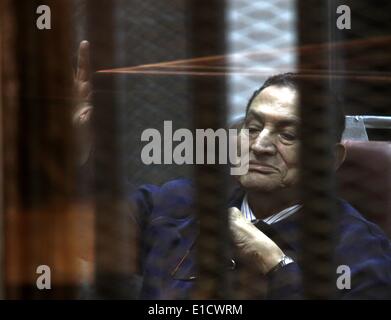 Cairo, Egypt. 31st May, 2014. Former Egyptian President Hosni Mubarak attends a hearing in his retrial over charges of killing of protesters during the 2011 Revolution, at the Police Academy in Cairo, Egypt, May 31, 2014. Credit:  Ahmed Gomaa/Xinhua/Alamy Live News Stock Photo