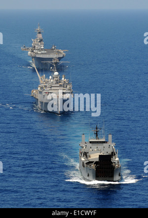 From left, Philippine navy ship BRP Dagupan City (LC 551), amphibious transport dock USS Denver (LPD 9) and the forward-deploye Stock Photo