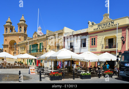 Outdoor restaurants in Marsaxlokk Square, Marsaxlokk, South Eastern District, Malta Xlokk Region, Republic of Malta Stock Photo