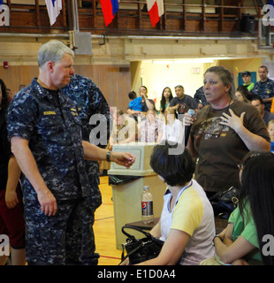 Chief of Naval Operations Adm. Gary Roughead answers questions from Sailors and their families May 13, 2010, at Naval Support A Stock Photo