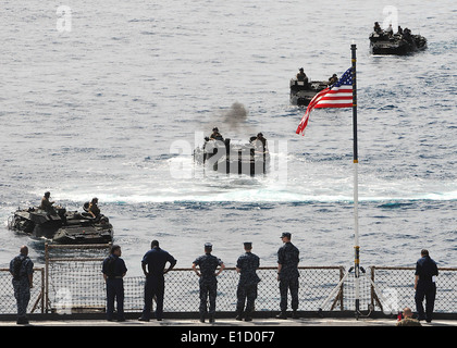 100506-N-8377A-068 SOUTH CHINA SEA (May 6, 2010) - Marine Corps amphibious assault vehicles (AAV) return to the USS Tortuga ( Stock Photo