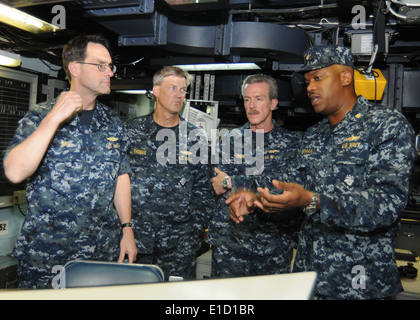 From left, U.S. Navy Vice Adm. John M. Bird, commander of U.S. 7th Fleet, Rear Adm. David Thomas and Rear Adm. Richard Wren lis Stock Photo