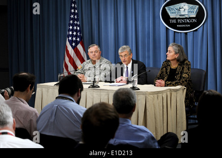 From left, Inspector General of the Army Lt. Gen. R. Steven Whitcomb, Secretary of the Army John M. McHugh and Kathryn Condon, Stock Photo