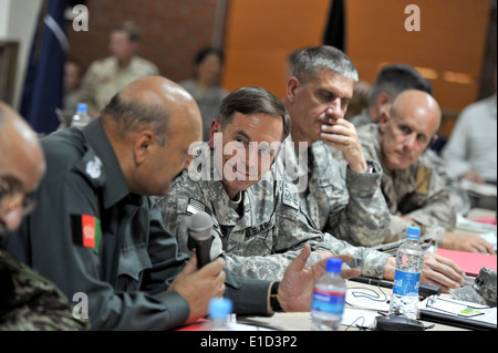 From left, Afghan National Army Gen. Munir Mangal, deputy minister of security; U.S. Army Gen. David H. Petraeus, commander of Stock Photo