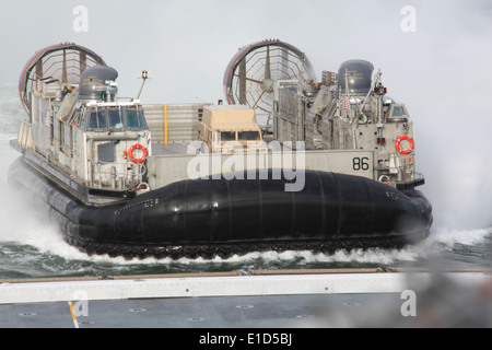 A landing craft, air cushion boards USS New York (LPD 21) off the shore of Naval Station Norfolk, Va., Oct. 29, 2009. (DoD phot Stock Photo