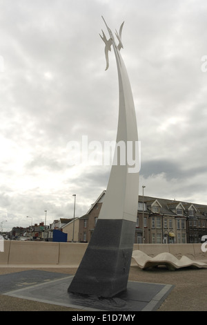 Grey clouds portrait 'Sea Swallow Sculpture, towards Victoria Road West, Cleveleys Promenade, Fylde Coast, UK Stock Photo