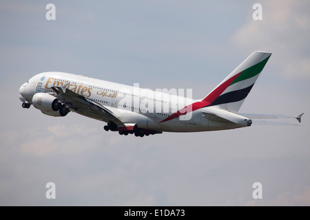 Emirates Airbus A380 double deck, wide body, four-engine jet airliner manufactured by Airbus taking off Stock Photo