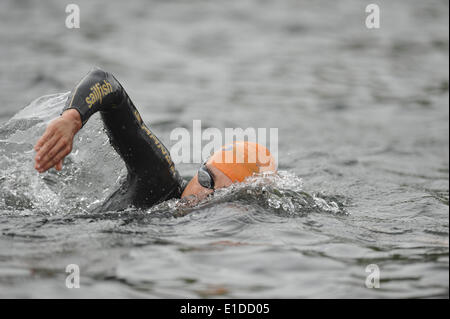London, UK. 31st May, 2014. A female swimmer warming up for the swimming component of the ITU Elite Women's Triathlon in the Serpentine, Hyde Park. Credit:  Michael Preston/Alamy Live News Stock Photo