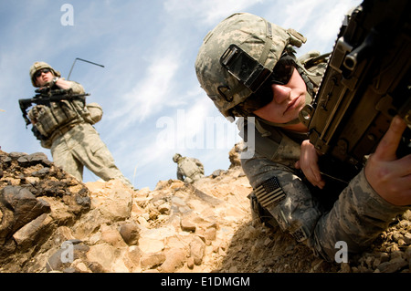 U.S. Army Private First Class Brialynn Lanteigne provides security for a traffic control point in the Sabari District of Afghan Stock Photo