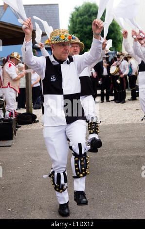 Mayflower morris men from Basildon dancing in the courtyard of the Bell Inn Great Bardfield Essex UK on 31st May 2014.  Morris Dancing is an English folk dance.  The performance is part of a festival called the  Morris ring which is held has been held annually in Thaxted since 1934 Stock Photo