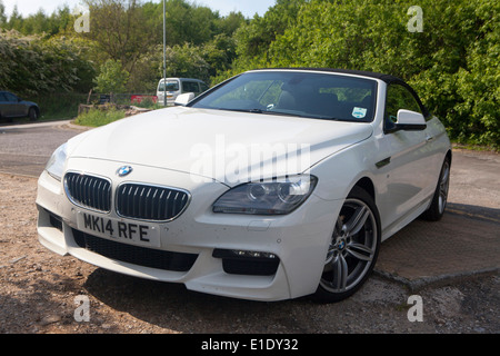 White BMW 6 Series M Sport Convertible 2 door 640d parked Stock Photo