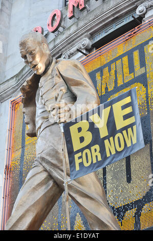 Tottenham Court Road, London. UK. 1st June 2014. The statue of Freddie Mercury holds a 'Bye for Now' banner as the long running West End musical closes at the Dominion Theatre. Credit:  Matthew Chattle/Alamy Live News Stock Photo