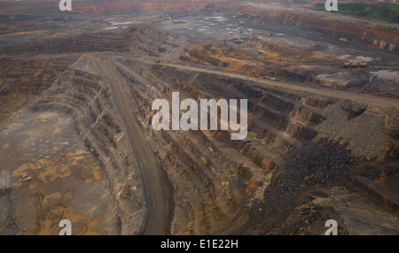 An aerial view of a large, open cast copper and gold mine. Stock Photo