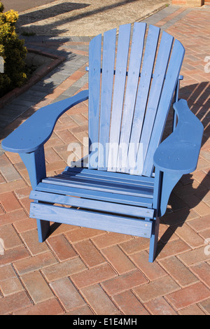 A handmade Adirondack style chair Stock Photo
