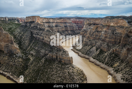 A deep canyon cut into rock formation by flowing river. Wyoming, USA. Stock Photo