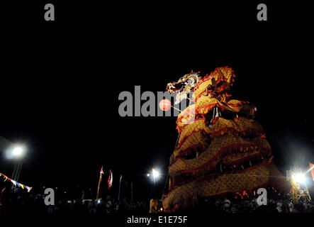 (140602) -- YOGYAKARTA, June 2, 2014 (Xinhua) -- A giant paper dragon is displayed during the Chinese traditional Dragon Boat Festival in Yogyakarta, Indonesia, June 2, 2014. The Dragon Boat Festival, also called Duanwu Festival, is traditionally celebrated on the fifth day of the fifth lunar month, which falls on June 2 this year. (Xinhua/Oka Hamied)(cy) Stock Photo