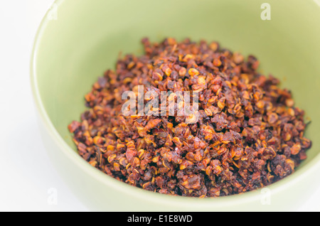 top view of crushed pepper pile , dried red chili flakes Stock Photo