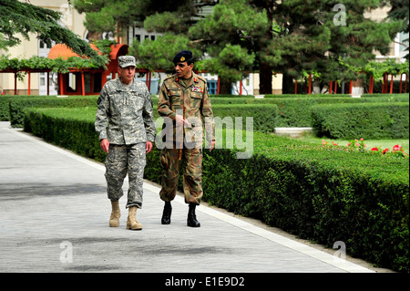 U.S. Army Gen. David Petraeus, the commander of the International Security Assistance Force, talks with Pakistani Chief of Army Stock Photo