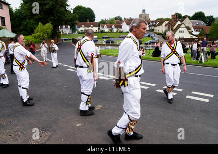 Hageneth morris men from Stowmarket in Suffolk dancing at the Fox Inn Finchingfield, Braintree, Essex, England, UK . The dancers are participating in the Morris Ring festival.  Morris dancing is an English folk dance.  31stMay 2014. Stock Photo