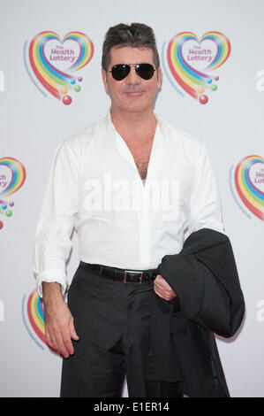 London, UK. 2nd June 2014. Simon Cowell arrives at the Health Lottery VIP tea party held at the Savoy in Central London, on Monday June 2, 2014. Credit:  Heloise/Alamy Live News Stock Photo